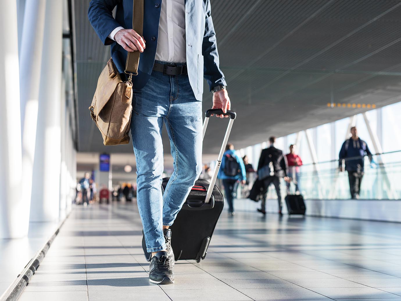 Man ready for travel with a bag